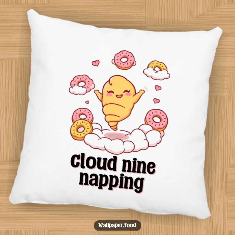Funny croissant pillow featuring a giggling croissant character twirling joyfully amidst donut clouds, offering plush comfort.