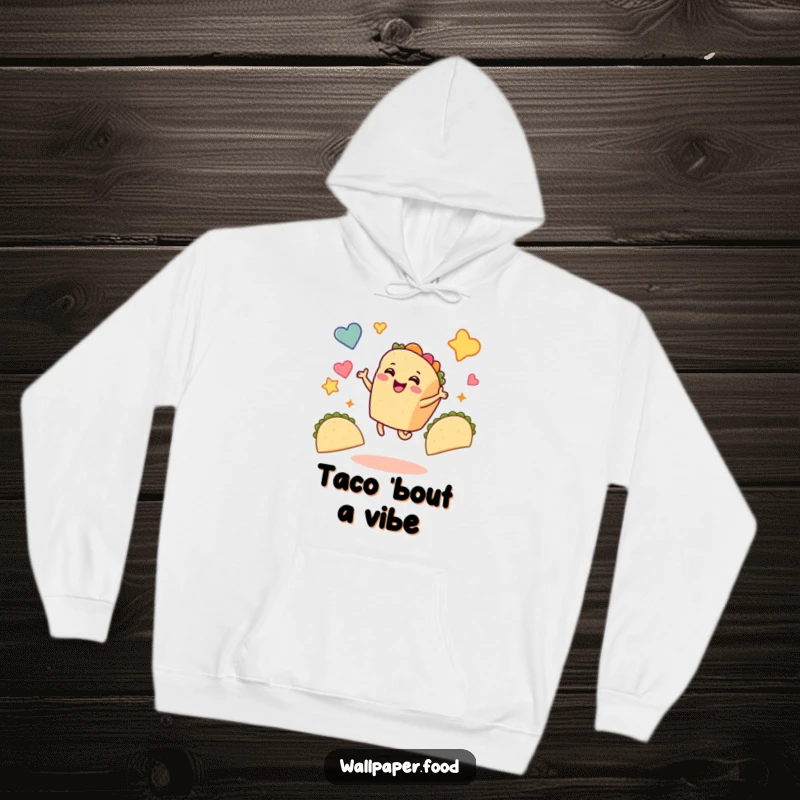 Funny taco hoodie with a smiling taco character dancing ecstatically amidst floating taco shapes, a symbol of festive celebration.