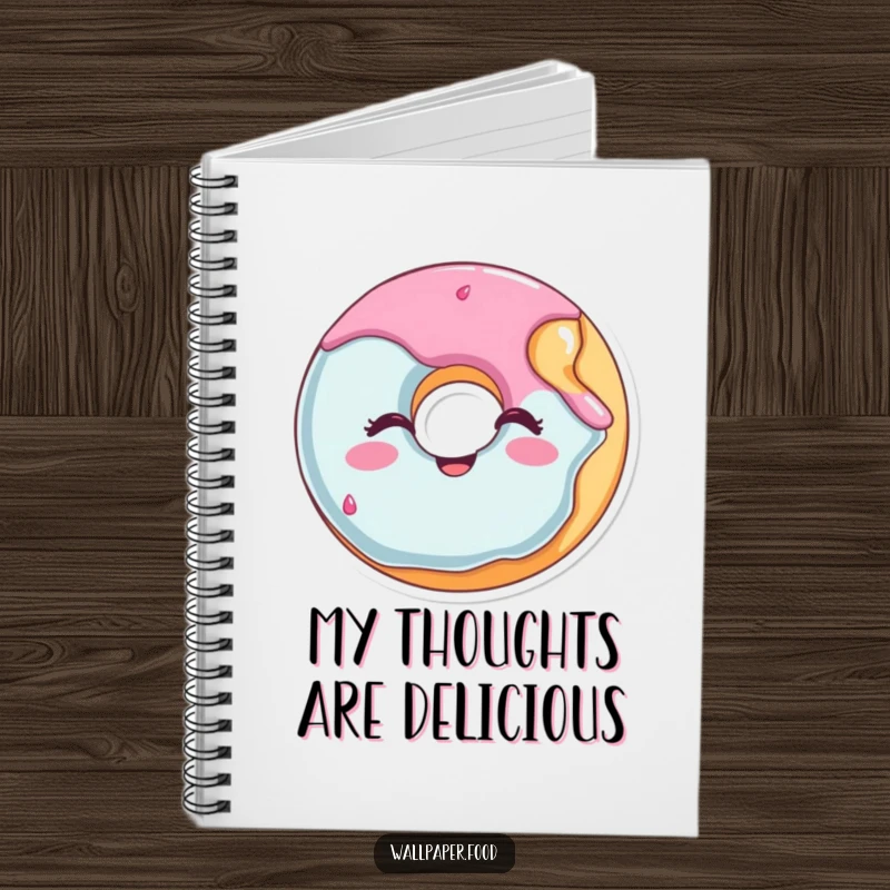 Funny donut notebook with a cheerful winking donut and a bite out, ideal for capturing ideas with a smile.