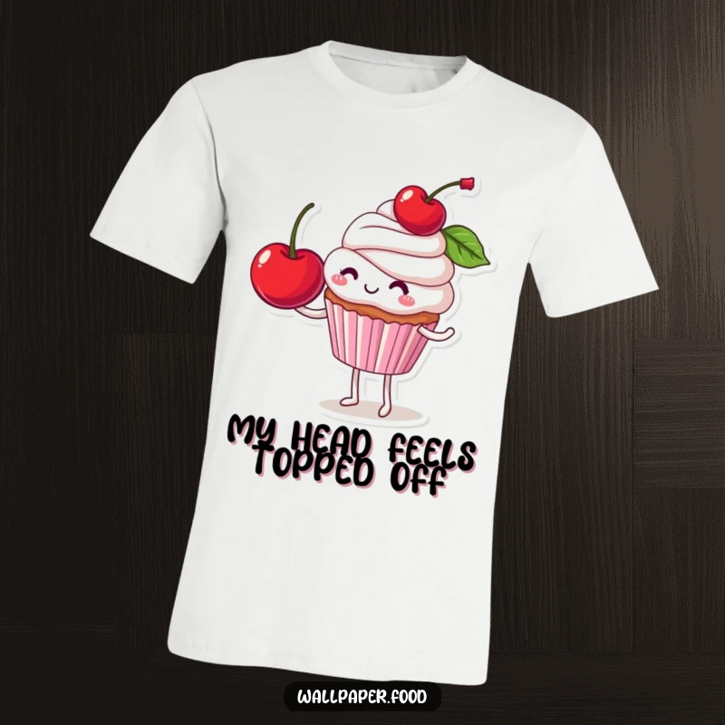 Funny T-shirt with a smiling cupcake character attempting to balance a huge cherry, showcasing a hilarious struggle and sweet grin.